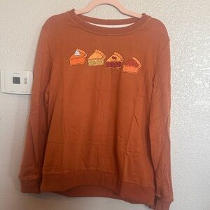 Women's Rust Orange Crewneck Sweater with Pie Slice Appliqué